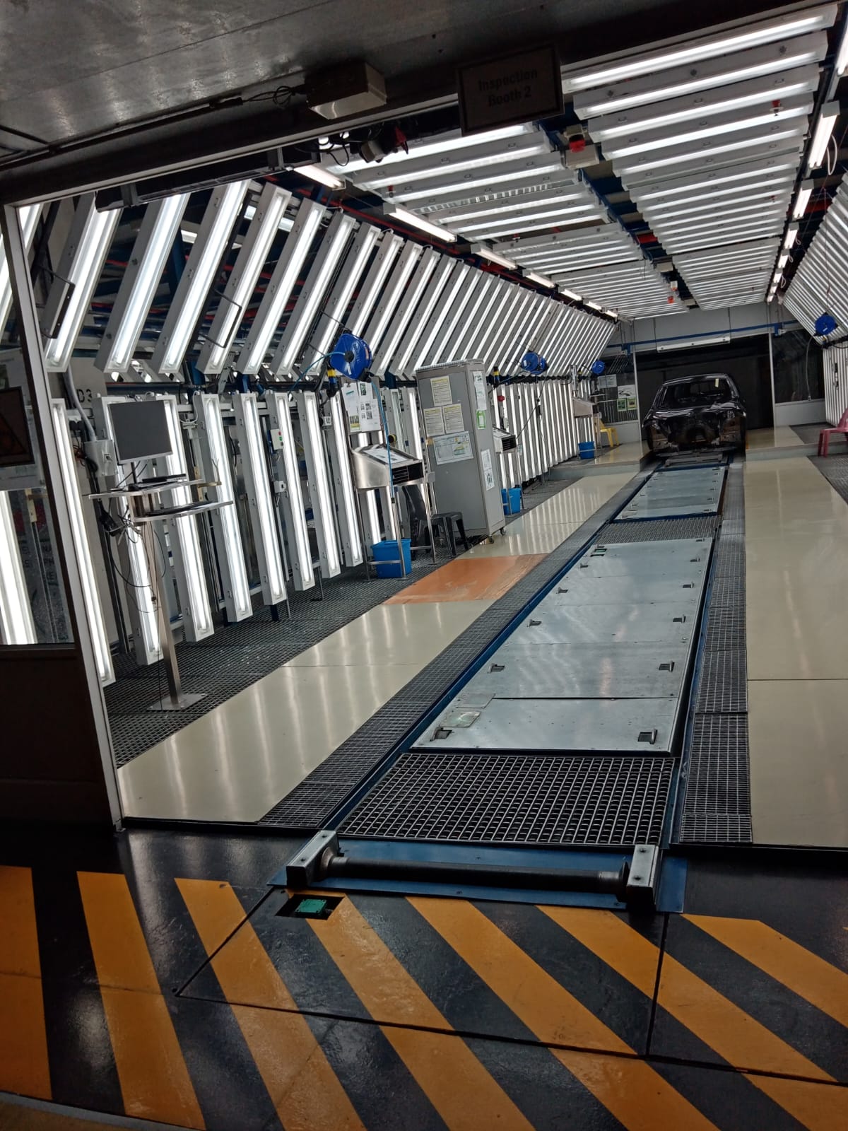 Industrial inspection booth maintenance